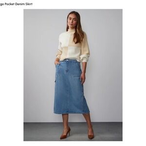 Midi-length denim skirt; four-pocket design w/center back slit